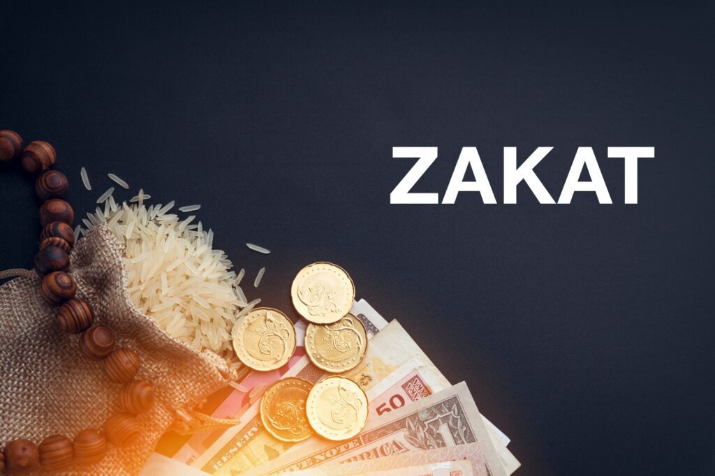 Coins, cash, and rice representing Zakat, an Islamic charitable practice.